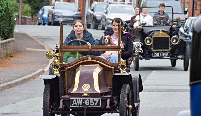 A classic Renault car leads the way into Wybunbury (1)