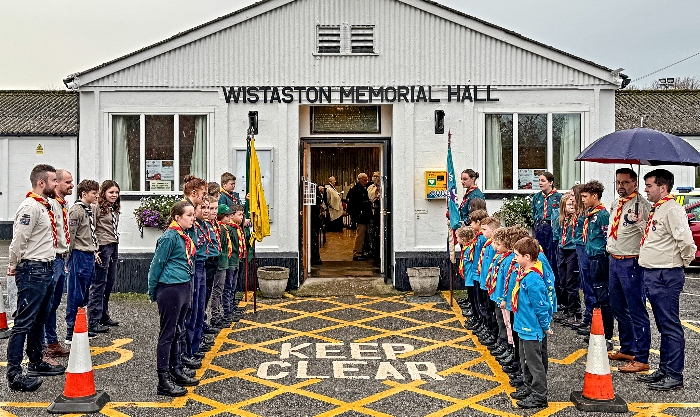 Beavers, Cubs and Scouts prepare to give a Guard of honour, despite the rain (1)