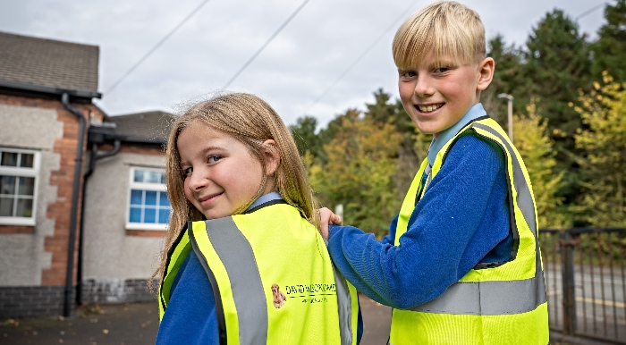 DWNW - SGB-57595 - The reflective vests will help to keep the children safe by the roadside (1)