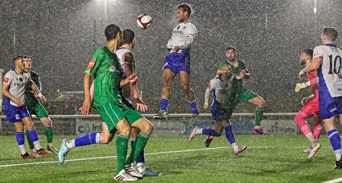 First-half - Bury head the ball clear in the rain (1)