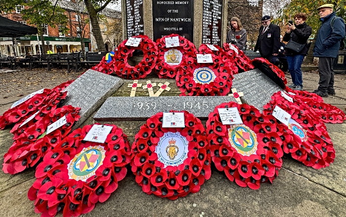 Members of congregation view the wreathes after the Remembrance Service (1)