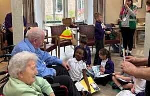 Nantwich care home residents welcome pupils in reading project