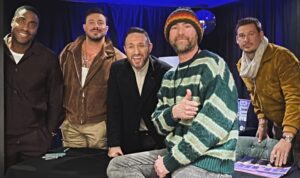 Hundreds queue at Nantwich music store to meet boy band Blue
