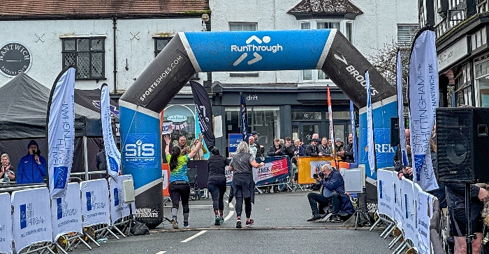 Runners cross finish line (1)