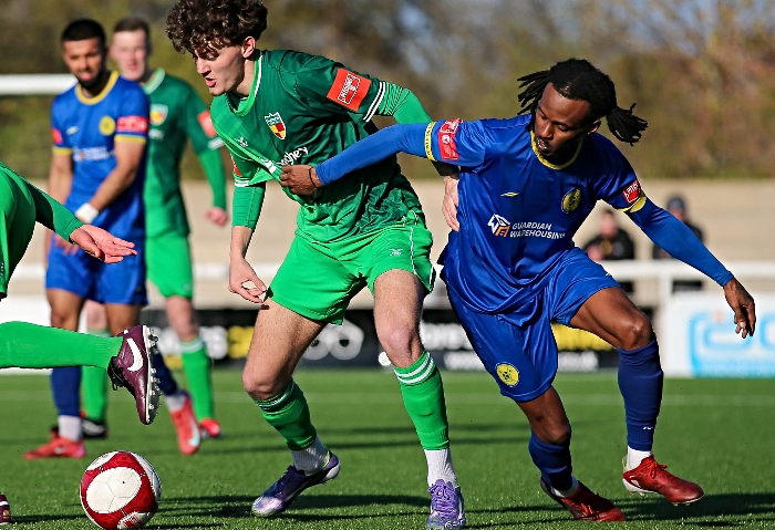 Second-half - opposition players eye the ball (1)
