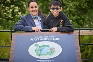 Eden from Pear Tree Primary School has won a competition to draw the David Wilson Homes - Maylands Park pond sign. 

Pictured with sales adviser Penny