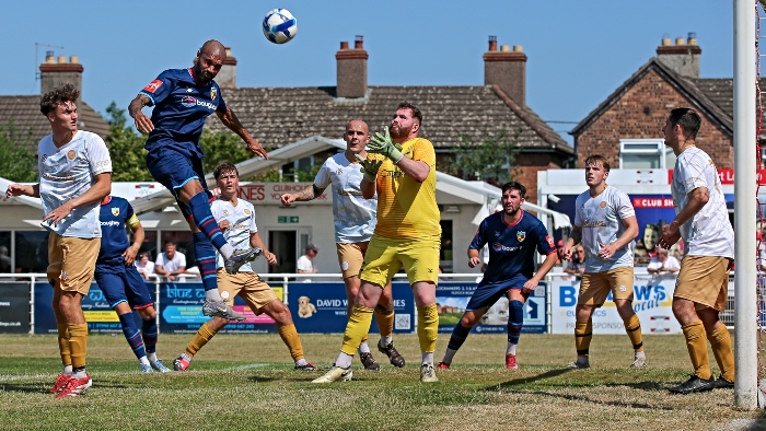 First-half - Byron Moore climbs to head at goal (1)