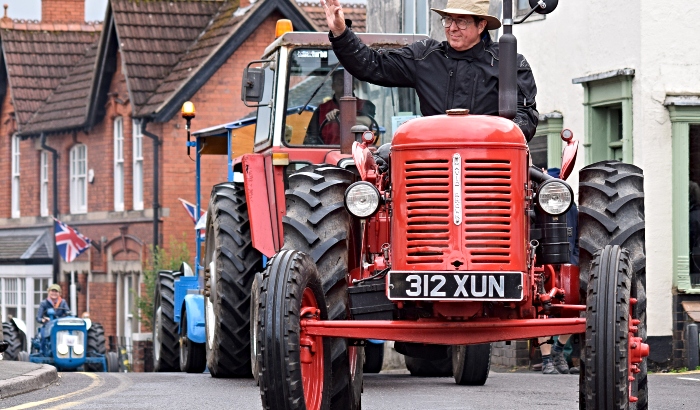 Tractor owner waves to the crowds (1)