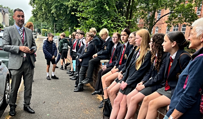 headteacher John Harrison talks to pupils at end of the walk