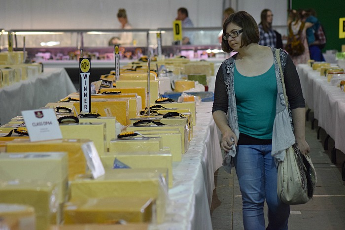 A visitor views the cheeses at the Cheese Show