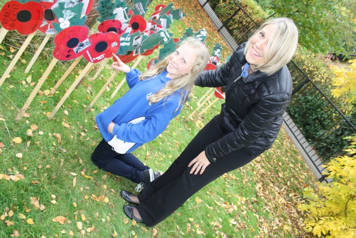 Anna Crighton shows her mum, Sally Crighton, her memorial to her great grandfather who served in the Navy in WW2