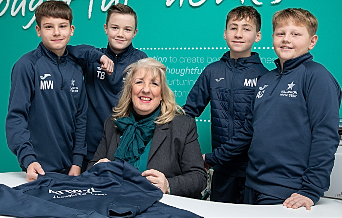 Anwyl Homes Sales advisor Julie Young with (LR) Max White, Thomas Bullock, Ellis Wright and Aiden Cope