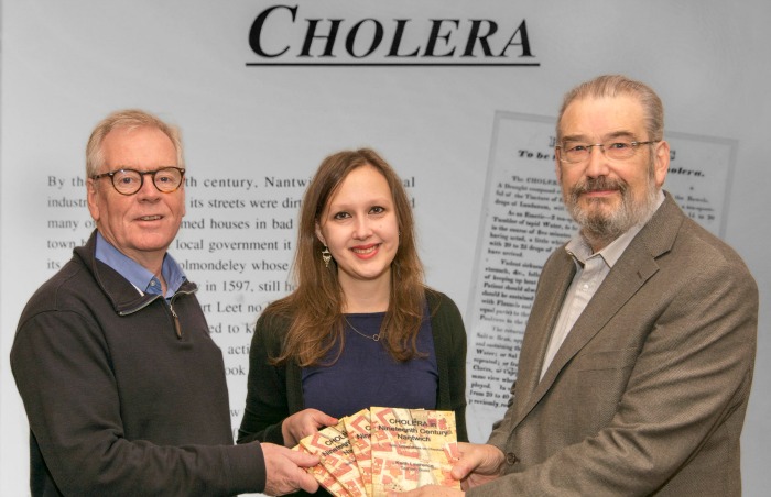 Author Keith Lawrence right presents Chair of the Museum Trust, Nick Dyer and Museum Manager, Denise Courcoux with copies of Cholera in Nineteenth Century Nantwich Photo Paul Topham