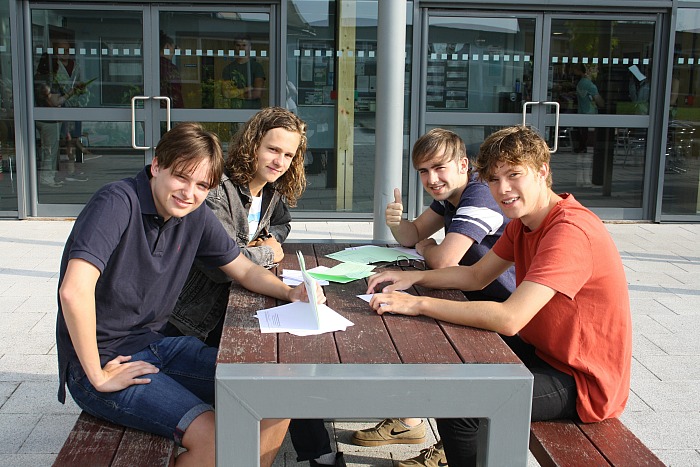 BL6 students Brad Stocking, James Howell-Jones, Callum Coleman and Osian Wolley compare grades and discuss future destinations