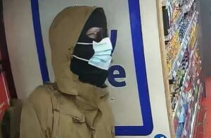CCTV images of armed robber who targeted Crewe minimart store