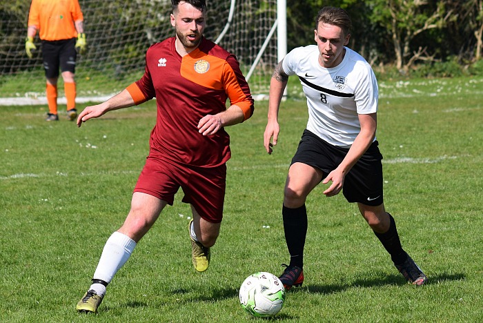 Salvador v AFC Leopard Both players eye the ball