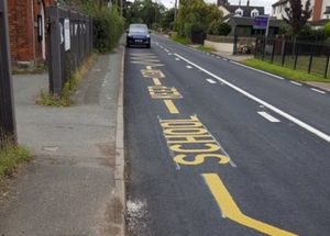 Highways staff paint ‘keep clear’ lines outside school closed 10 years ago