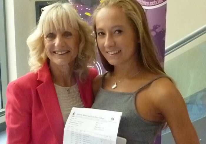 Cara Gibbons celebrating her GCSE results with Mrs Walker