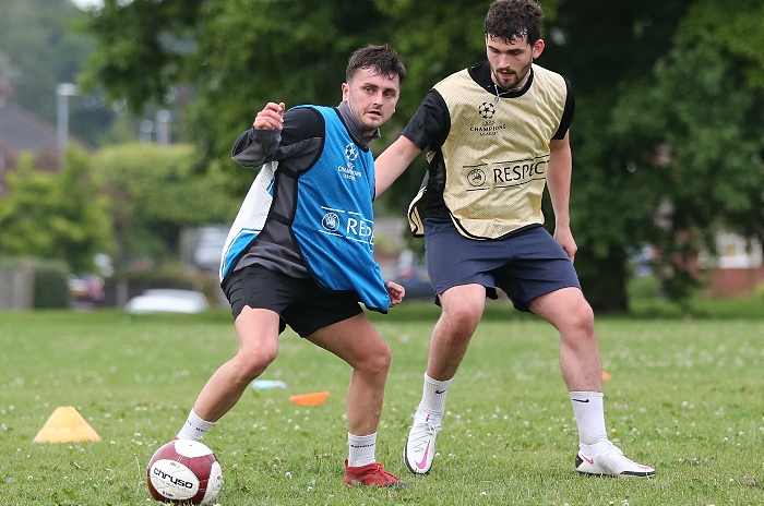 Caspar Hughes looks to the pass the ball during a practice match (1)