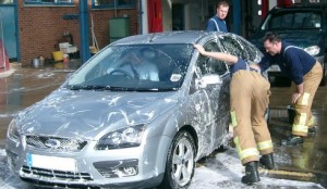 Nantwich firefighters splash out with charity car wash