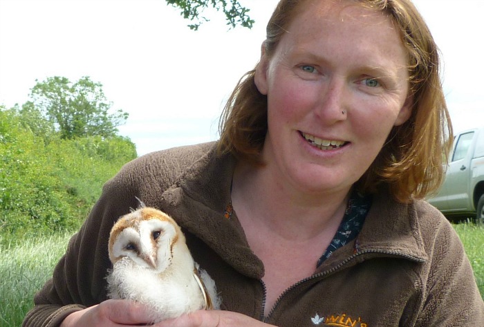 Charlotte Harris with one of the barn owl chicks