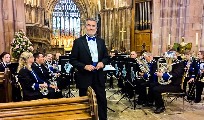 Conductor David Woollam and members of The Band & Drums of the Cheshire Constabulary