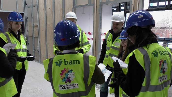 Crewe E&D UTC students survey the extension building with BAM