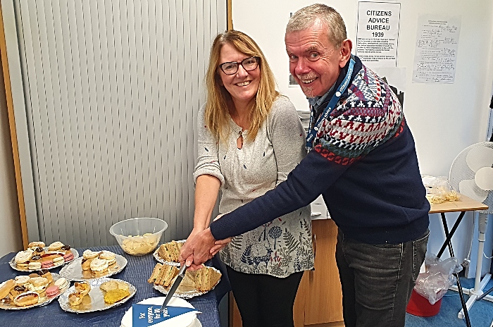 Cutting the 80th birthday cake in Citizens Advice Cheshire East's Nantwich office to mark 80 years of Citizens Advice in Cheshire East (1)