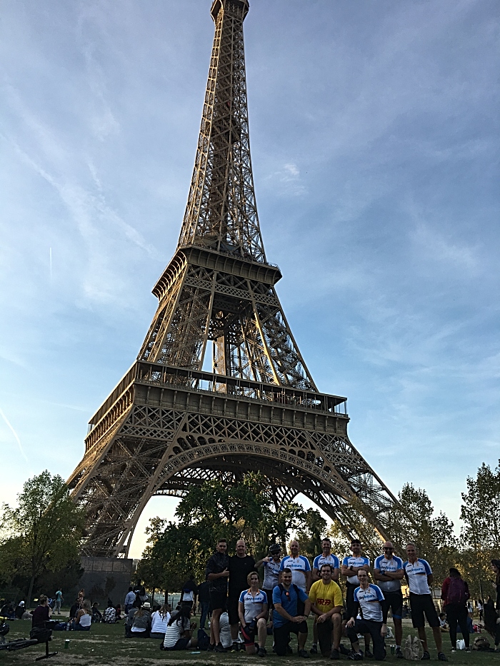 Cyclists finish their ride at the Eiffel Tower in Paris (1)