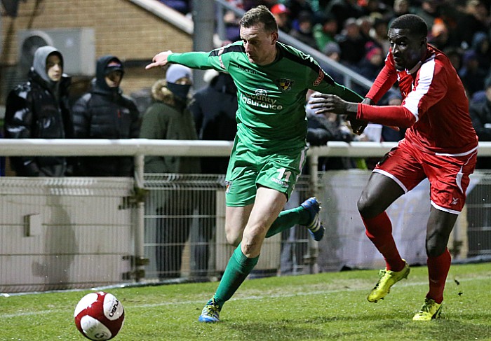 Dave Forbes fights for the ball