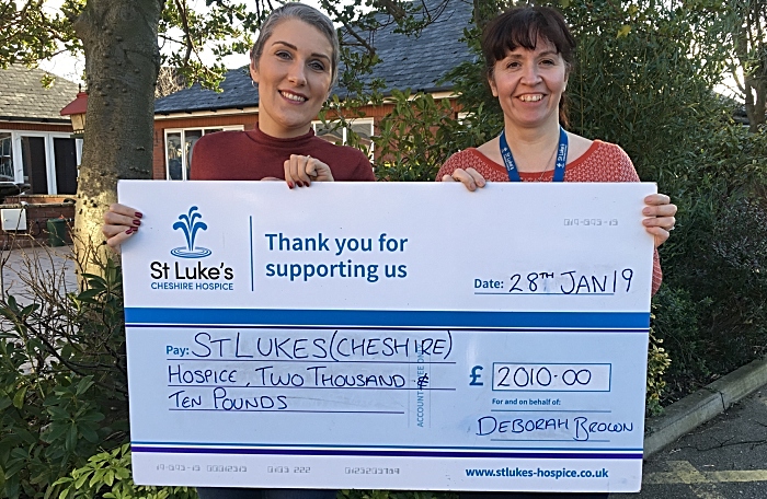 Debbie (left) presenting a cheque to St Luke's Community Partnerships Fundraiser Rachel Hughes (left)