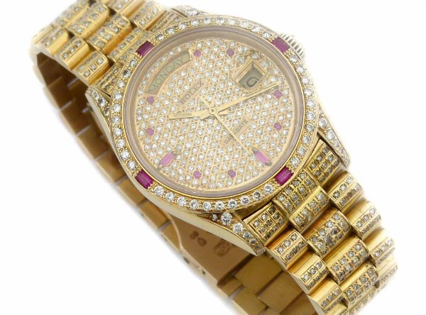 Diamond_and_ruby_encrusted_gold_Rolex_President_£7500