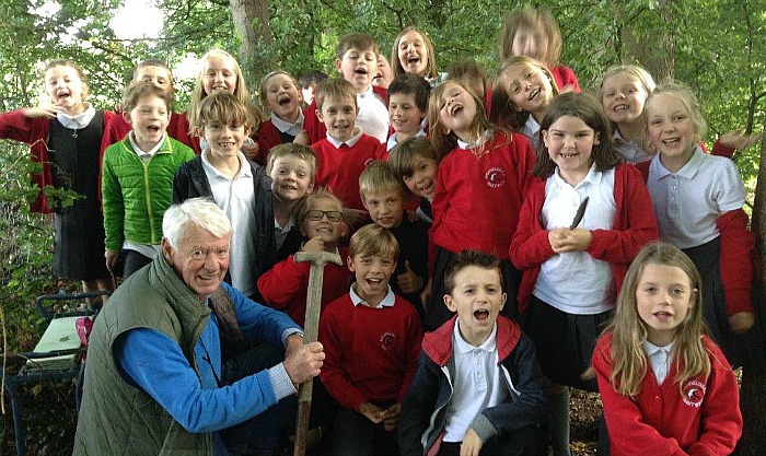 Doug Butterill and Highfields School youngsters in hedgehogs scheme