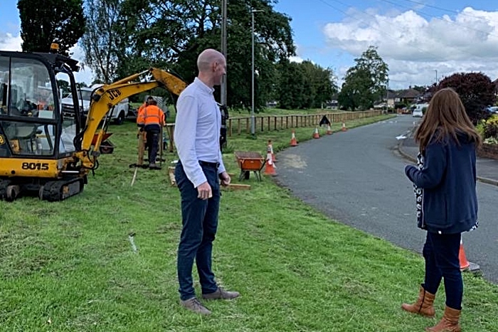 Dr Mullan and Friends of Barony campaigner Rachel Wright as fence goes up around park