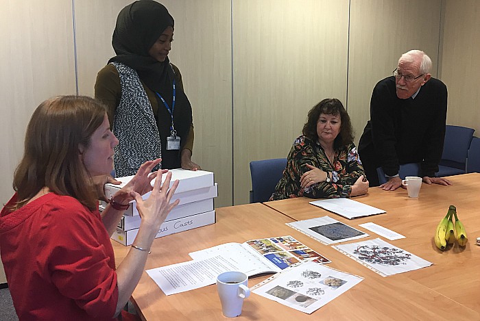 DrJenny Myers (left) and Matina Hakim talk to the family about their research