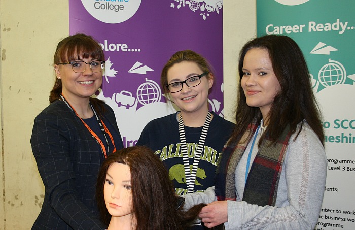 careers - Elena Bonam and Georgina Gwinn try out their hairdressing skills, watched over by Julia Sanders from South Cheshire College Arts, Business and Services Department