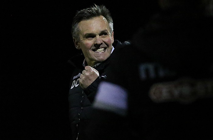 Final whistle - Manager Dave Cooke punches the air in celebration