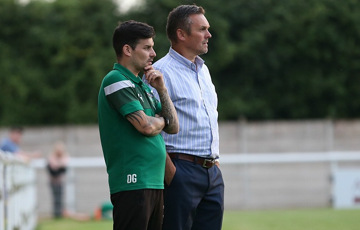 First Team Manager Dave Cooke and Assistant Manager Danny Griggs assess the action