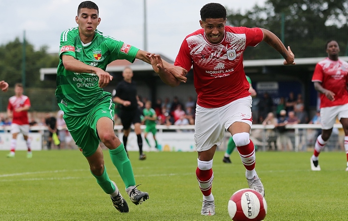 First-half - Carlos “Thommy” Montefiori fights for the ball (1)