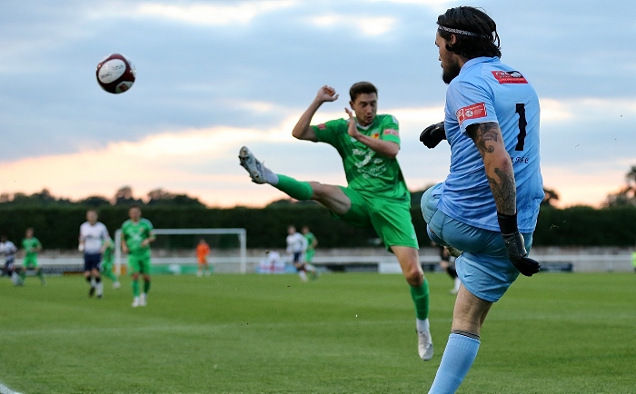 First-half - Matlock keeper Shaun Rowley clears under pressure from Shaun Miller (1)