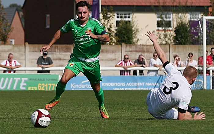 First-half - captain Caspar Hughes wrong-foots Witton defender James Short leaving him on the deck (1)