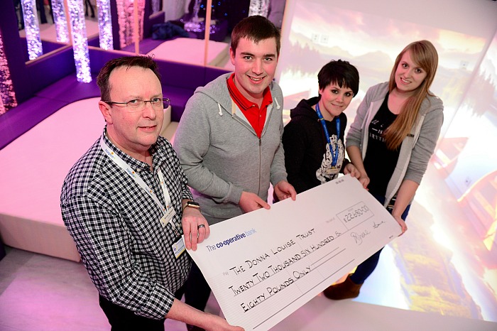 Pictured left to right: Mike McDonald - Chief Executive at DLH, Graham Witter, Nikki Wrench - Challenge Events Manager, and Nikki Culverwell - Play Specialist Cheque presentation to the Donna Louise Hospice of £22680 from Weston Christmas lights