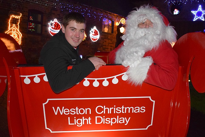 weston - graham-witter-with-santa-claus-in-the-life-size-santa-sleigh