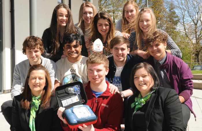 Harrison Lunt and friends and YBS staff with defib
