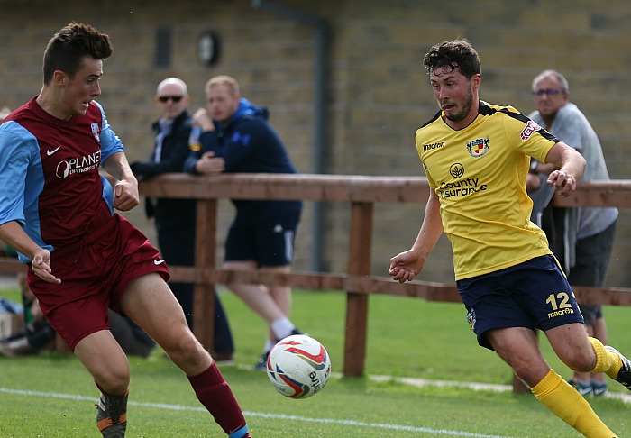 Harry Clayton eyes the ball