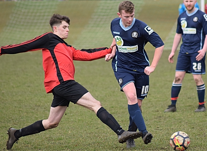 Haslington FC look to take the ball from Nantwich Pirates (1)