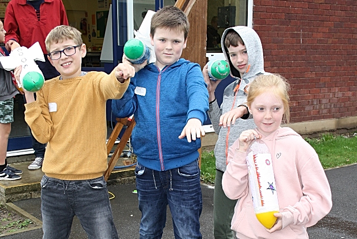 Henry Lesson, Luke Downey, Harry Stockton and Holly Hornby excitedly await for their rockets to be launched