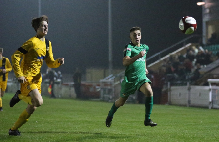 Jake Davies chases the ball for Nantwich_Fotor