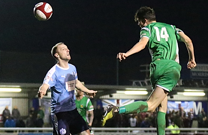 Joe Malkin heads the ball into the opposition box (1)