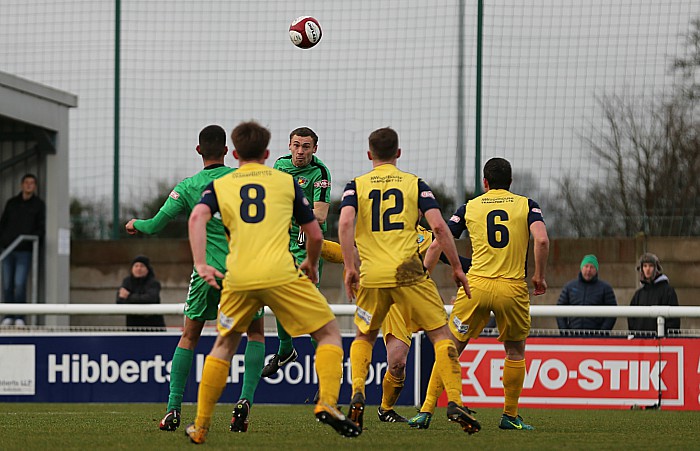 Joel Stair heads the ball at goal